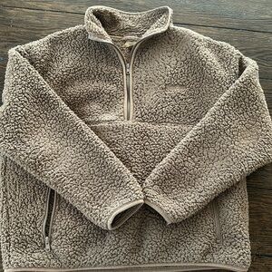 Skims half zip
